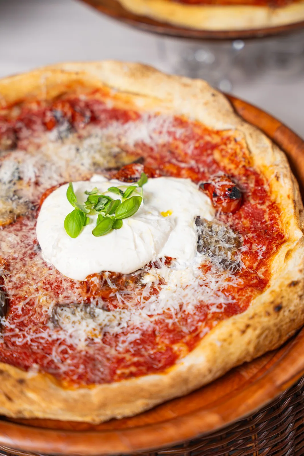 Italian pizza with burrata and basil