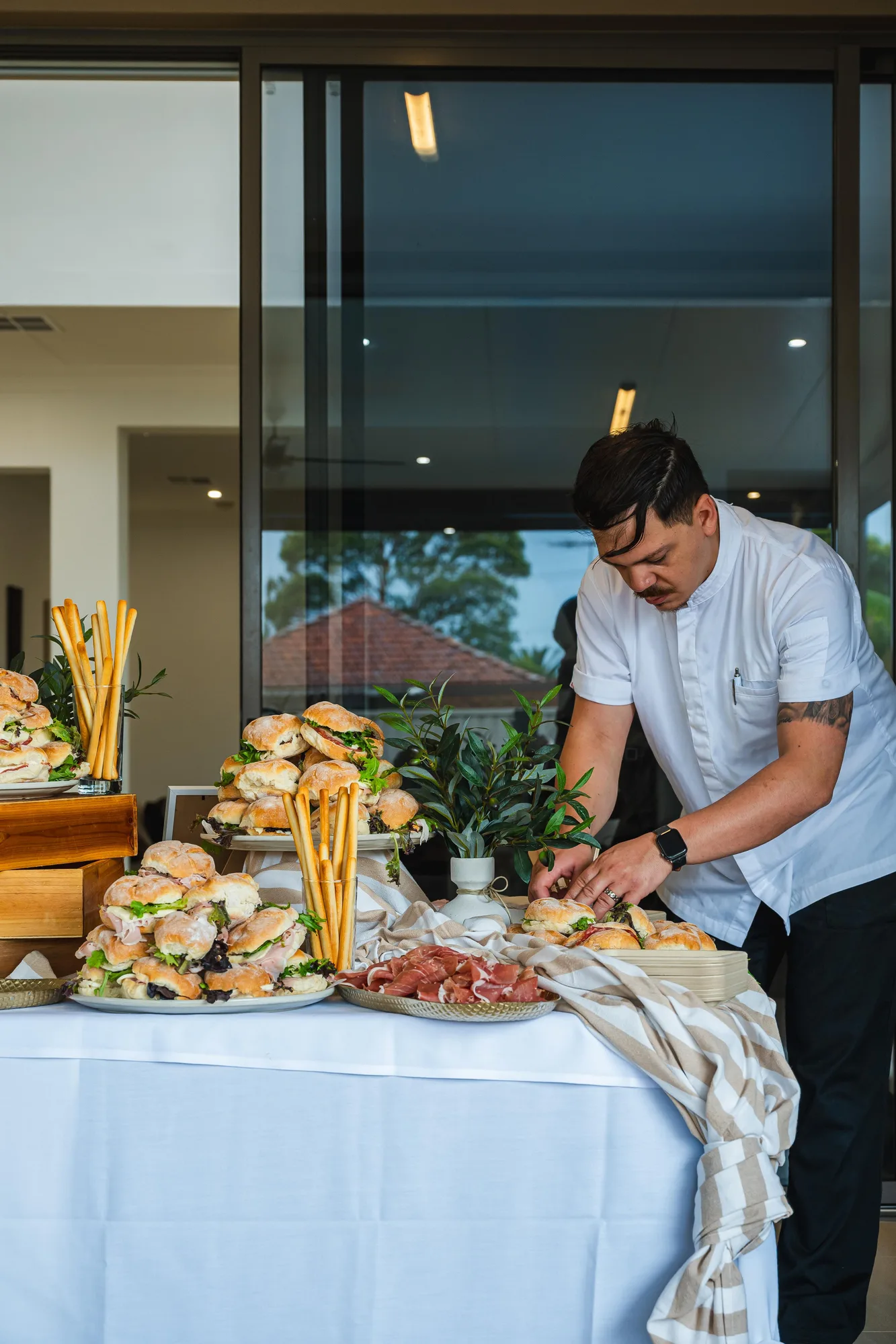 Chef Gabriele Franco plating at a private catering event in Sydney